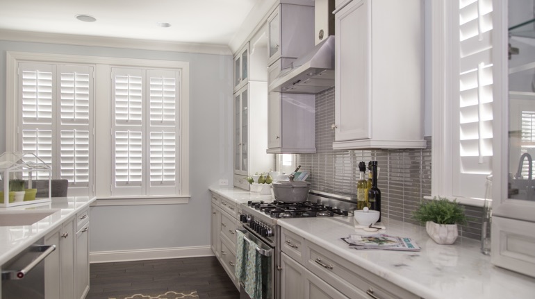 Polywood shutters in Salt Lake City kitchen with modern appliances.